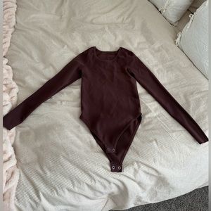 never been worn lululemon bodysuit